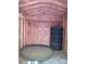Outbuilding's interior with wood paneling and storage at 1051 S Brady Ave, Newton, NC 28658