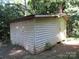 Weathered exterior of outbuilding with board and batten siding at 1051 S Brady Ave, Newton, NC 28658