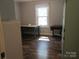 Room with wood floors and natural light at 1051 S Brady Ave, Newton, NC 28658