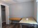 Versatile room featuring neutral walls and wood floors at 1051 S Brady Ave, Newton, NC 28658