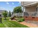 Well-maintained backyard with a deck, lush lawn, landscaping, and privacy fence, great for entertaining at 108 Planters Dr, Statesville, NC 28677