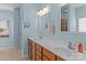 Bathroom with double vanity, tile floor, and good natural light at 108 Planters Dr, Statesville, NC 28677