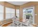 Dining room with hardwood floors and sliding door leading to backyard at 108 Planters Dr, Statesville, NC 28677