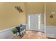 Bright foyer with hardwood floors, complemented by decorative touches and natural light at 108 Planters Dr, Statesville, NC 28677