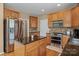 Modern kitchen with stainless steel appliances, a center island and ample cabinet space at 108 Planters Dr, Statesville, NC 28677