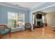 Living room with hardwood floors, fresh paint, decorative fireplace and good natural light at 108 Planters Dr, Statesville, NC 28677