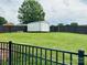 Fenced backyard and shed offer ample outdoor storage space at 111 Brookview Dr, Shelby, NC 28152