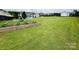 Spacious backyard featuring a charming vegetable garden and ample green space at 111 Brookview Dr, Shelby, NC 28152