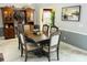 Formal dining area features elegant table, chandelier lighting, and a decorative cabinet at 111 Brookview Dr, Shelby, NC 28152