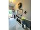 Welcoming foyer with tiled floors, a console table, and a decorated red door at 111 Brookview Dr, Shelby, NC 28152