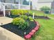 Inviting front yard featuring a colorful flower bed with fresh black mulch at 111 Brookview Dr, Shelby, NC 28152