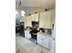 Modern kitchen features stainless steel appliances, including a refrigerator and range, with stylish tiled flooring at 111 Brookview Dr, Shelby, NC 28152