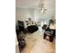 Spacious living room with comfortable seating and tiled floors, with a view to dining area at 111 Brookview Dr, Shelby, NC 28152