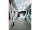Large outdoor patio with outdoor seating and clear view of pool at 111 Brookview Dr, Shelby, NC 28152