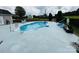 Backyard swimming pool featuring an expansive patio area, ideal for lounging at 111 Brookview Dr, Shelby, NC 28152