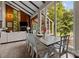 Bright dining room featuring large windows and a wood dining table and seating for six guests at 1111 Palmyra Dr, Fort Mill, SC 29708