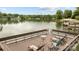 Lakefront deck with railings, several chairs, and a small table with waterfront views at 1111 Palmyra Dr, Fort Mill, SC 29708