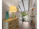 Bright foyer with wood floors, exposed beam ceiling, and a glimpse of a lake view through the large window at 1111 Palmyra Dr, Fort Mill, SC 29708