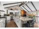 Spacious open-concept kitchen with a granite island, stainless steel appliances, and a unique beamed ceiling at 1111 Palmyra Dr, Fort Mill, SC 29708