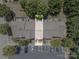 Overhead view of townhome with parking and clearly defined property lines and surrounding greenery at 11218 Grass Field Rd # 1083, Charlotte, NC 28213