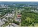 Aerial view showcases the property's location, surrounded by lush green spaces and nearby amenities at 11218 Grass Field Rd # 1083, Charlotte, NC 28213