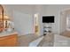 Cozy bedroom with walk-in closet, tv and ensuite bathroom at 11218 Grass Field Rd # 1083, Charlotte, NC 28213