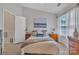 Relaxing bedroom featuring large window, closet and serene decor at 11218 Grass Field Rd # 1083, Charlotte, NC 28213