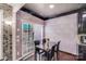 Charming dining area with natural light and stylish decor at 11714 Harsworth Ln, Charlotte, NC 28277