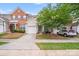 Charming townhouse with a well-manicured lawn, a driveway, and a one car garage at 11714 Harsworth Ln, Charlotte, NC 28277