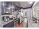 Well-equipped kitchen with stainless steel appliances and granite countertops at 11714 Harsworth Ln, Charlotte, NC 28277