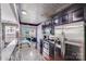 Modern kitchen features stainless steel appliances, granite counters, and dark cabinetry at 11714 Harsworth Ln, Charlotte, NC 28277