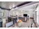 Open living space with modern kitchen, dining area, and cozy living room at 11714 Harsworth Ln, Charlotte, NC 28277