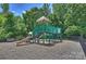 Community playground with play structure and slide, providing a fun and safe play area at 11714 Harsworth Ln, Charlotte, NC 28277