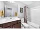 Clean bathroom with a shower-tub combo, tile floors, and vanity providing a comfortable and functional space at 1201 Township Pkwy, Belmont, NC 28012
