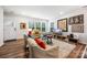 Inviting living room with lots of natural light with a comfortable seating area with contemporary decor at 1201 Township Pkwy, Belmont, NC 28012