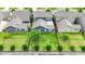 Aerial view of manicured backyard with privacy fence and neighborhood landscape showcasing lot and surroundings at 1284 Independence St, Fort Mill, SC 29708