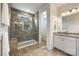 Updated bathroom featuring a glass shower, granite vanity, and modern fixtures at 1284 Independence St, Fort Mill, SC 29708