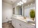 Bright bathroom with a double sink vanity, decorative mirror, and ample counter space at 1284 Independence St, Fort Mill, SC 29708