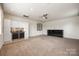 Expansive bonus room features built in cabinets, a beverage fridge, and modern finishes at 1284 Independence St, Fort Mill, SC 29708