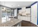 Modern kitchen boasts granite countertops, stainless steel appliances, and a stylish subway tile backsplash at 1284 Independence St, Fort Mill, SC 29708