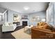 Comfortable living room featuring a fireplace, tv, and lots of seating at 1284 Independence St, Fort Mill, SC 29708