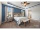 Spacious main bedroom features tray ceiling, ensuite bath, and neutral carpet at 1284 Independence St, Fort Mill, SC 29708