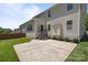 Expansive backyard with a concrete patio and lush green grass perfect for outdoor activities at 1300 Yellow Springs Dr, Indian Land, SC 29707