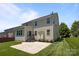 Spacious backyard featuring a well-maintained lawn, a concrete patio, and mature landscaping at 1300 Yellow Springs Dr, Indian Land, SC 29707