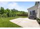 Serene backyard with a concrete patio, swing set, and plenty of space for entertaining at 1300 Yellow Springs Dr, Indian Land, SC 29707