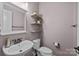 Charming bathroom featuring decorative shelves, mirror, and modern fixtures at 1300 Yellow Springs Dr, Indian Land, SC 29707