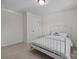 Cozy bedroom with a metal bed frame and a soft, inviting ambiance at 1300 Yellow Springs Dr, Indian Land, SC 29707