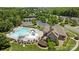 Aerial view of the community pool and clubhouse, set amidst lush greenery and recreational facilities at 1300 Yellow Springs Dr, Indian Land, SC 29707