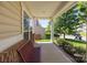 Inviting front porch with a bench, offering a pleasant view of the neighborhood at 1300 Yellow Springs Dr, Indian Land, SC 29707