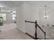 Upstairs loft with carpet and staircase leading to it and windows throughout at 1300 Yellow Springs Dr, Indian Land, SC 29707